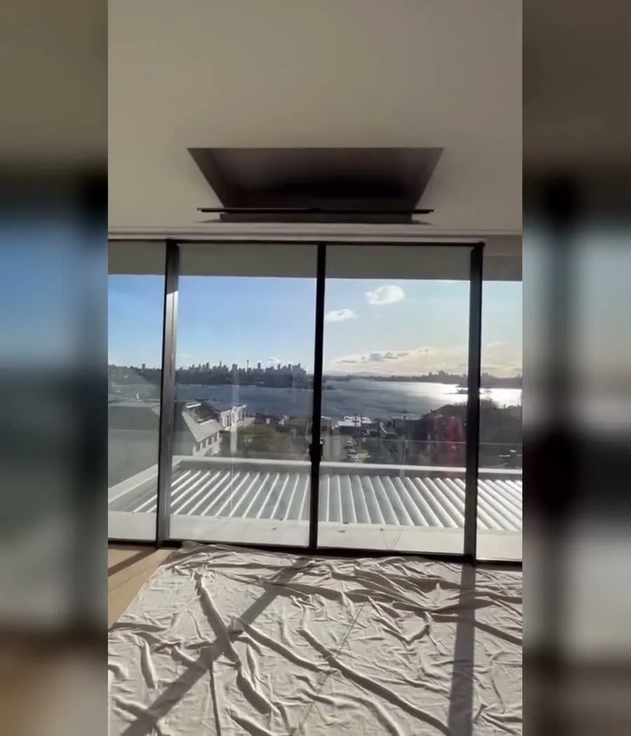 Spartan television lift lowering smoothly from a ceiling